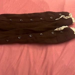 Brown and cream colored lace knit leg warmers